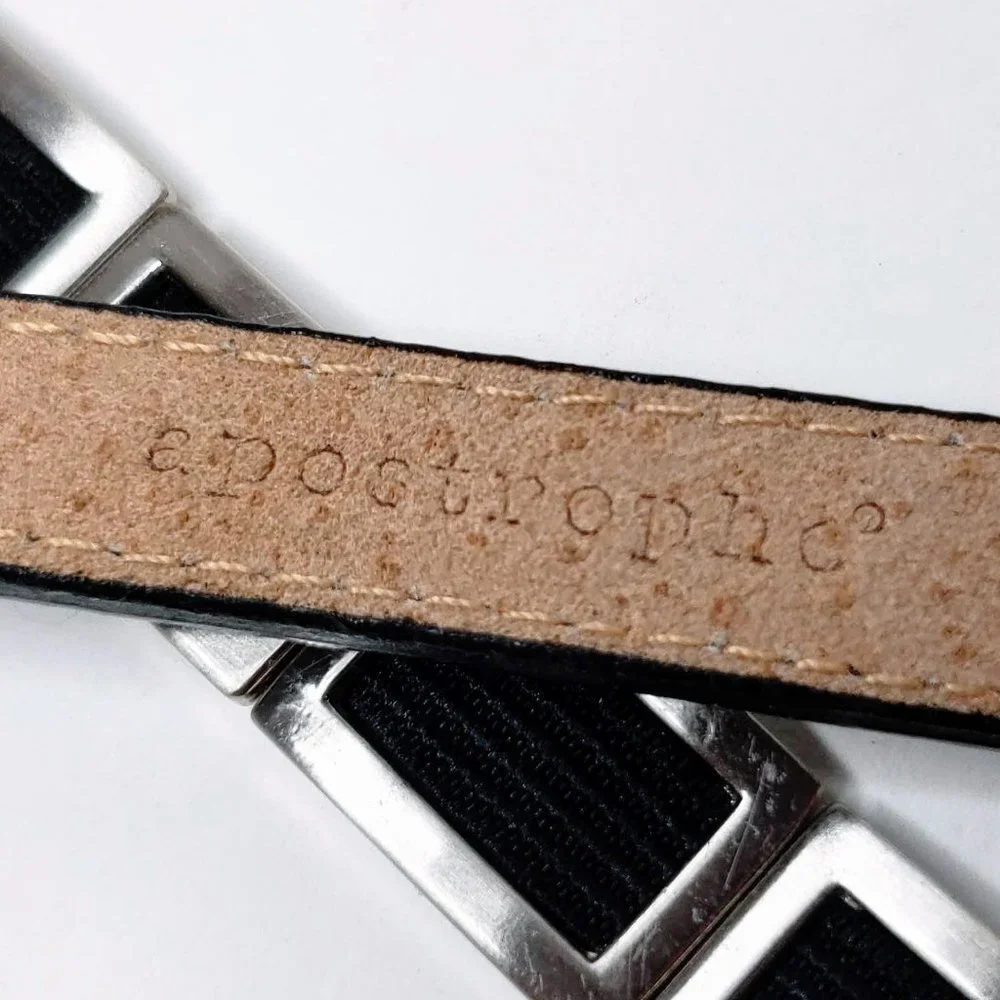 Apostrophe silver tone